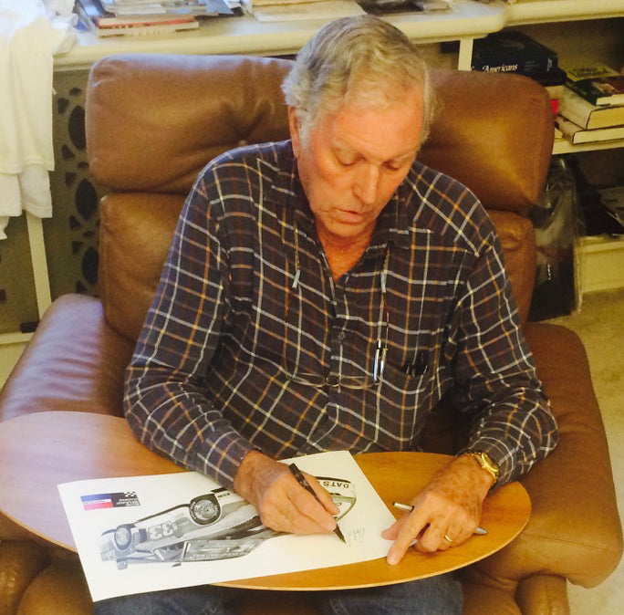 "The late Bob Sharp signing the original artwork at Smith Automotive Artwork" 
